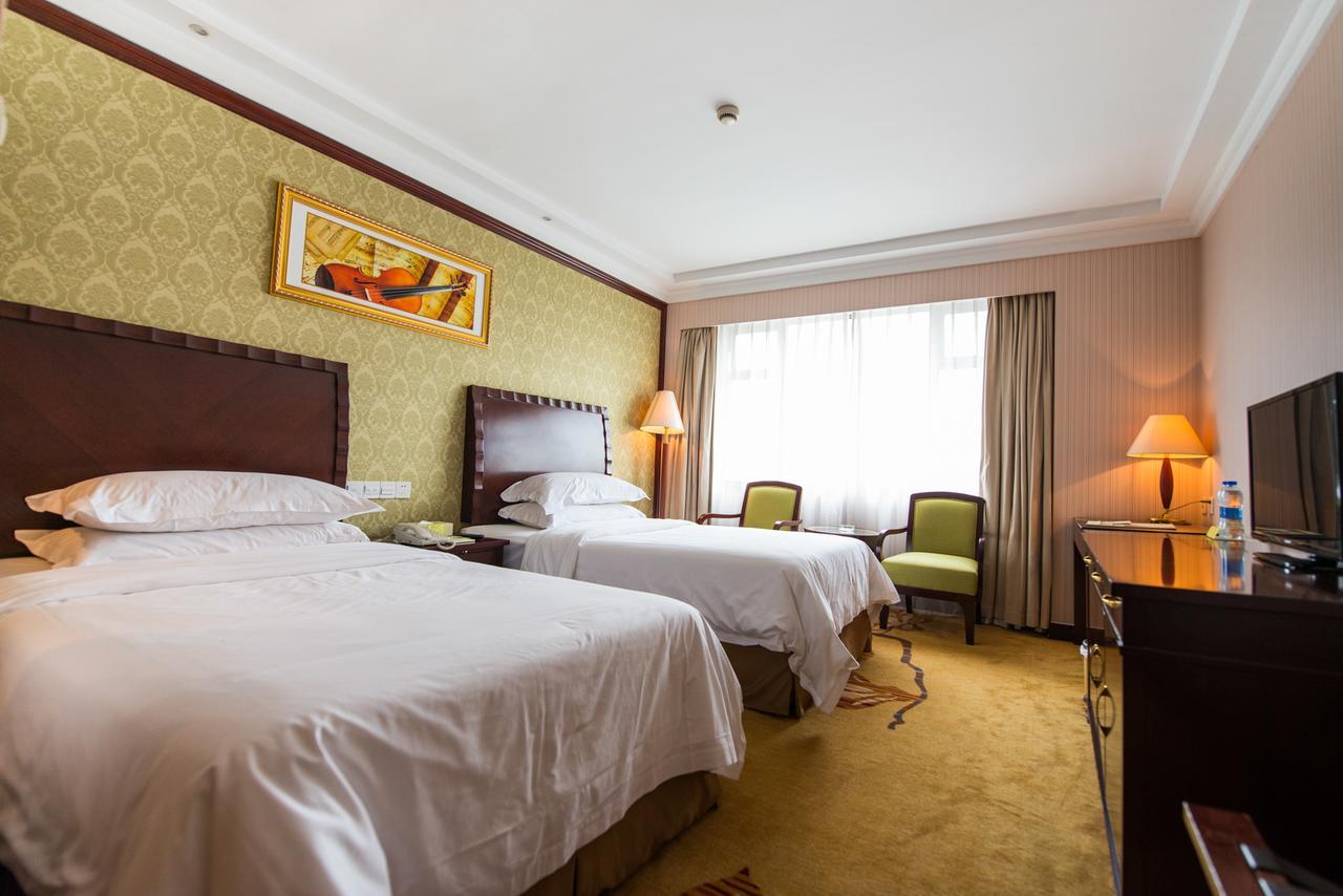 Vienna International Hotel Shanghai Train Station Екстер'єр фото
