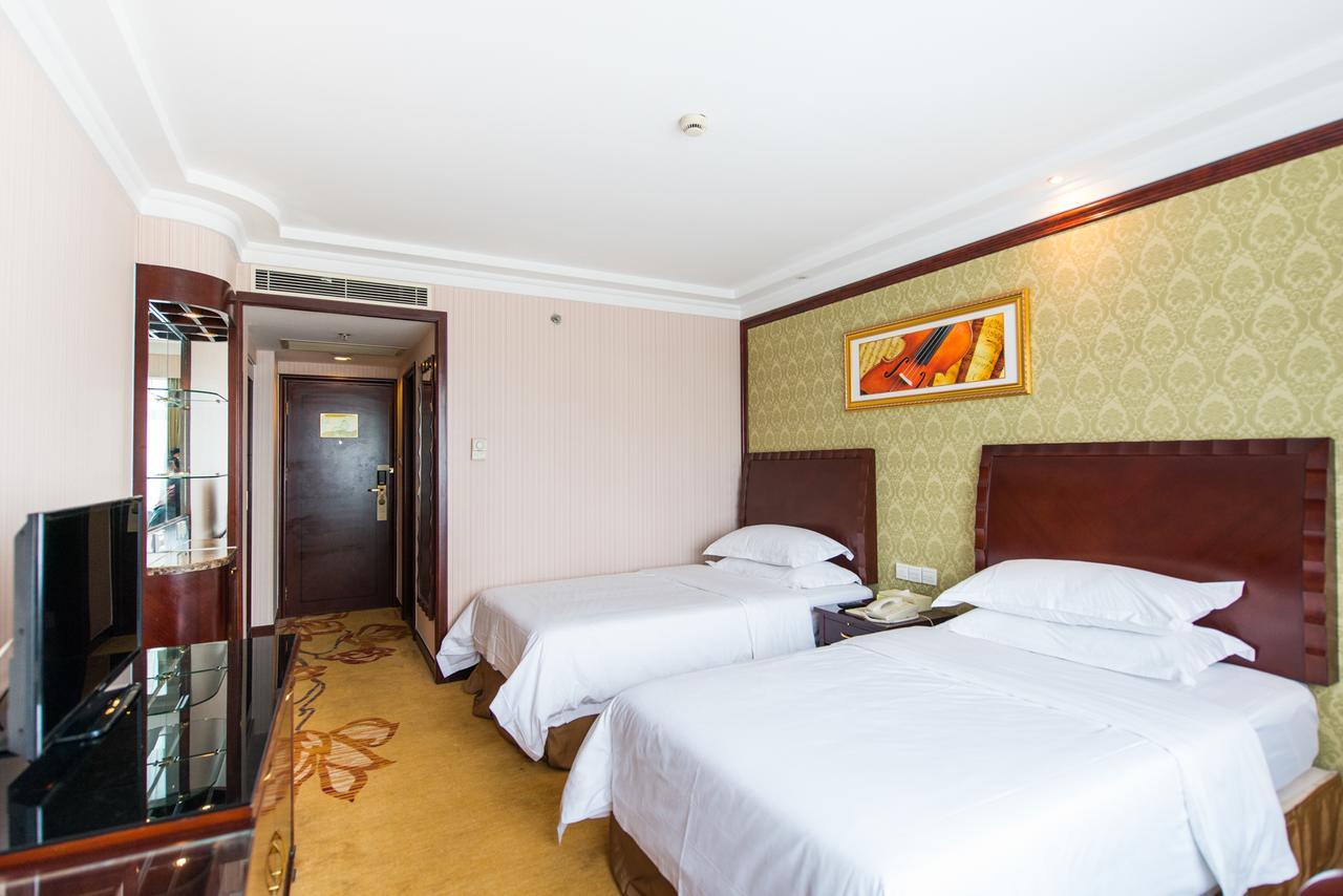 Vienna International Hotel Shanghai Train Station Екстер'єр фото